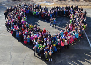 All Westside students formed a heart on their playground.