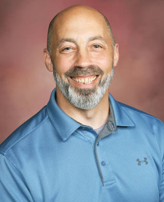 Photo of Mike Burgess,  Director of Information Technology 